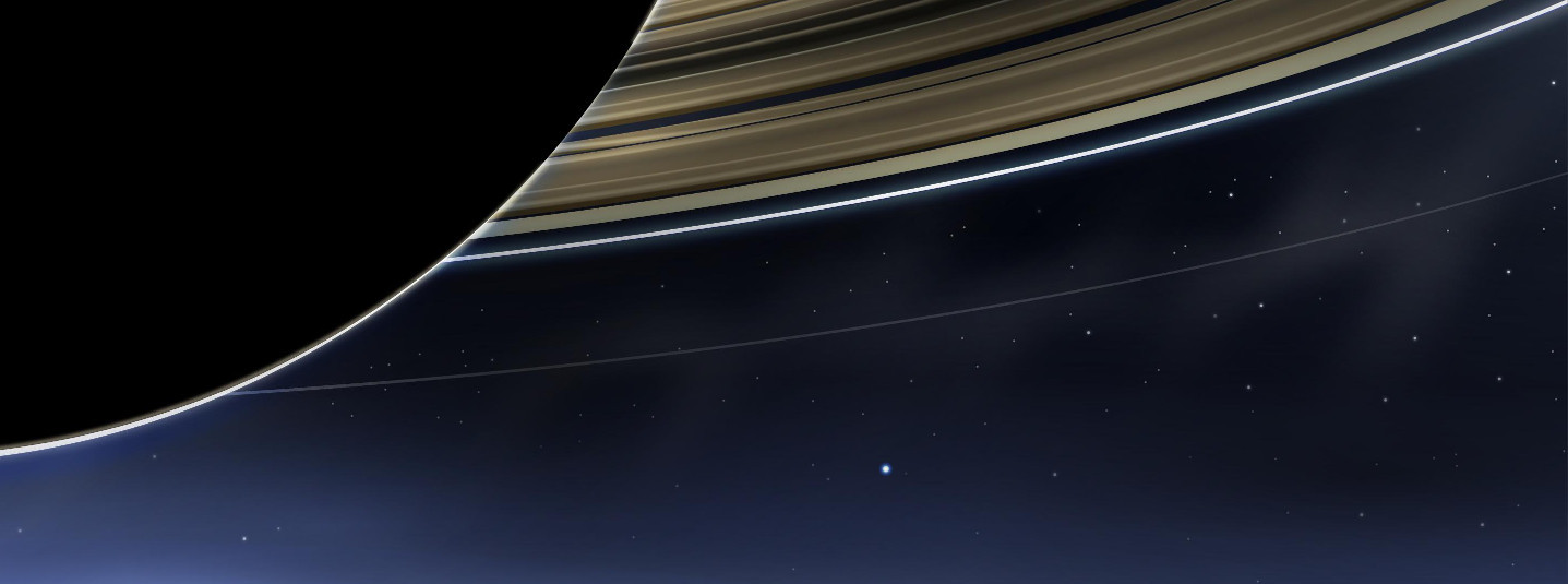Bild: Saturn im Vordergrund, Erde im Hintergrund