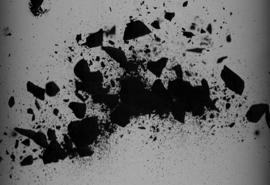 Standbild einer Laboraufnahme einer Kollision von Staubteilchen
